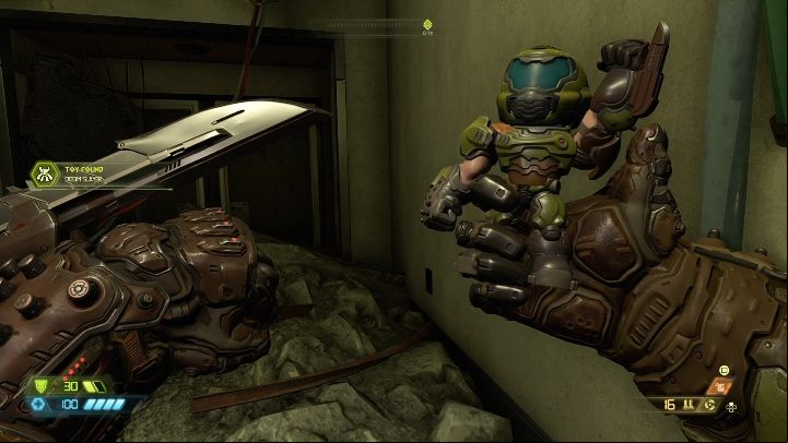 You will find a Doom Slayer doll behind a closed ageway, at the top of a destroyed building - Doom Eternal: Hell on Earth secrets maps and location - Collectibles and secrets - Doom Eternal Guide