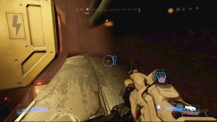 Once the path is clear, jump inside, run forward and then jump down on the left ledge - Doom: Argent Energy Tower Walkthrough - Walkthrough - Doom Game Guide & Walkthrough