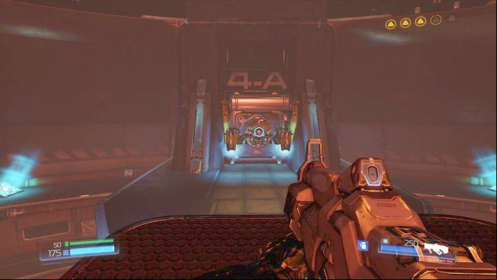It will take you to a platform with a lever which unlocks the Classic Map below (in the place where drones are hiding) - Doom: Argent Energy Tower Walkthrough - Walkthrough - Doom Game Guide & Walkthrough