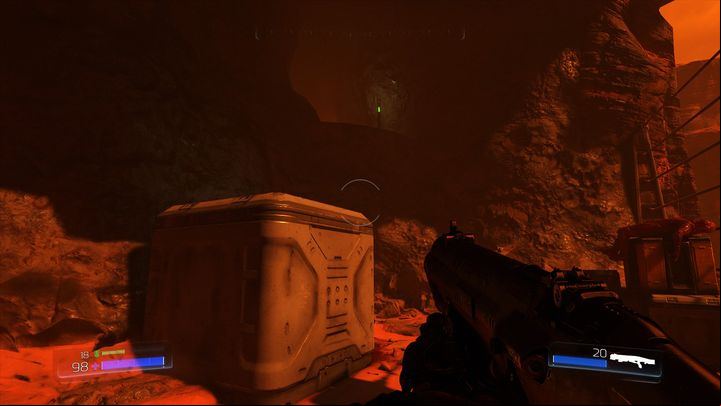 You wont jump to it from this side but there is a chest that will make it possible on the other side of the rock - Doom: The UAC Walkthrough - Walkthrough - Doom Game Guide & Walkthrough