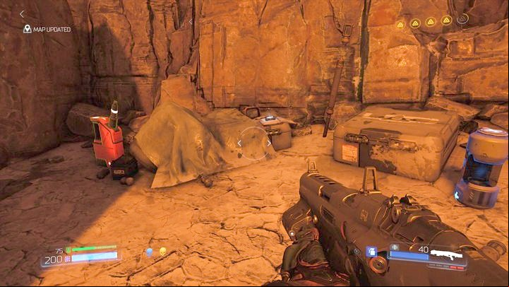 Keep going ahead after you defeat the first Baron of Hell and walk through the large gate - Doom: All secrets in Kadingir Sanctum - Secrets - Doom Game Guide & Walkthrough