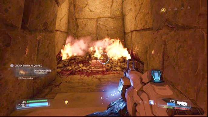 There is a green portal ahead of the skull - Doom: The Necropolis Walkthrough - Walkthrough - Doom Game Guide & Walkthrough