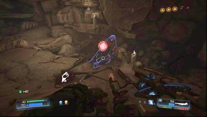 Once you take the first collectible, go to the other side of the cliff and wait the Mancubus that waits for you there - Doom: All secrets in The Necropolis - Secrets - Doom Game Guide & Walkthrough