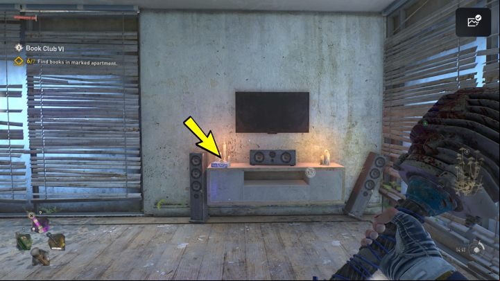 The seventh book is on the cupboard next to the TV set - Dying Light 2: Book Club 6 - walkthrough - Book Club tasks - Dying Light 2 Guide