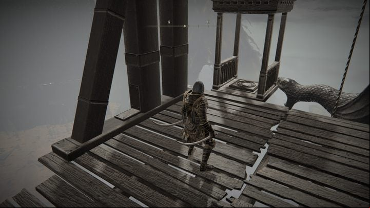 After reaching the stone balcony with shelves, go out into the open space and head to the elevator car - Shadow of the Erdtree: How to open the age behind the headless statue? - Secret locations - Elden Ring Guide