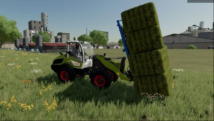 Front loaders have special tall forks, which are good at lifting and loading bales collected by forage wagons - Farming Simulator 22: Bailing - tips - Grass, hay and silage - Farming Simulator 22 Guide