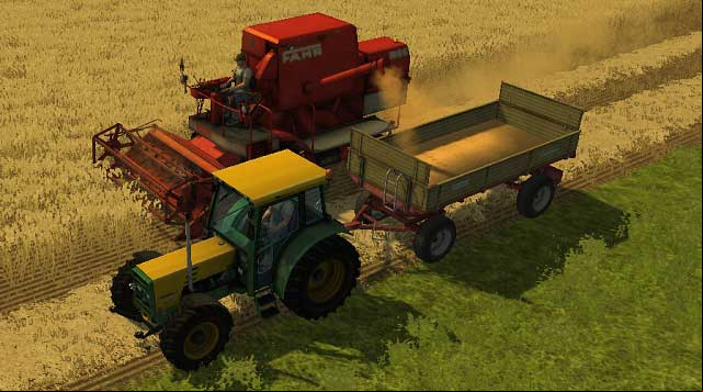 The worker is cutting the crops, while we are unloading the wheat. - Grains | Agriculture - Agriculture - Farming Simulator 2013 Game Guide
