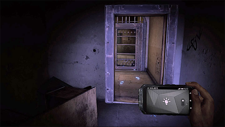 When exploring block B of the asylum, you will by John Keatings cell and reach the locked door presented in the screenshot - How to deal with the electronic door in the asylum (Black)? - Solving the puzzles - Get Even Game Guide