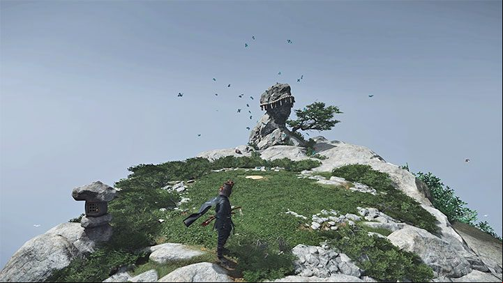 As you approach the top of the mountain, you will notice a question mark indicating a unique location on the summit - Ghost of Tsushima Iki Island: How to reach Saruiwa peak? - Secrets and Collectibles - Ghost of Tsushima Guide, Walkthrough