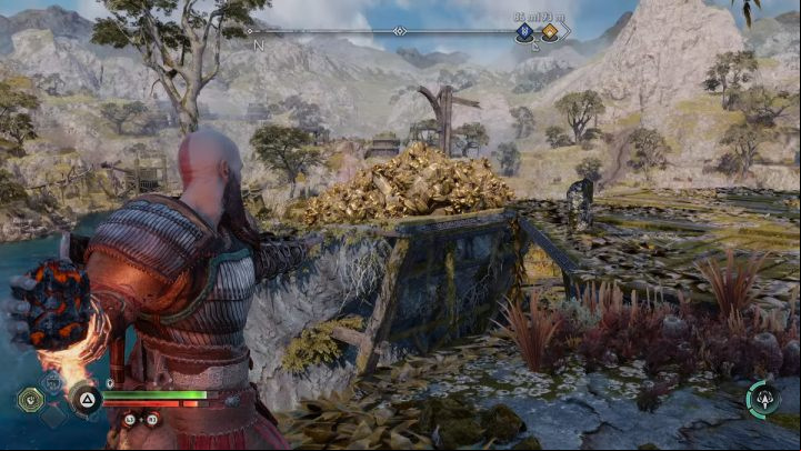 Pick up a bomb and destroy debris nearby - God of War Ragnarok: How to free Lyngbakrs fins and tail? - Exploration - God of War Ragnarok Guide