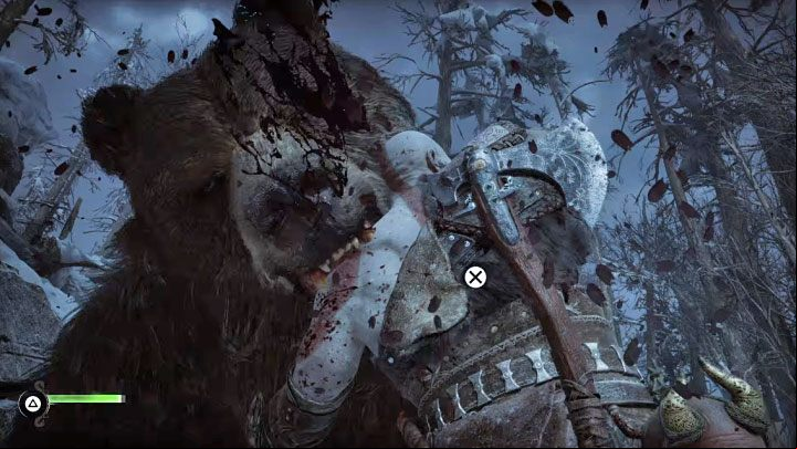 You must start the fight by quickly pressing the X button to free yourself from the bear's jaws - God of War Ragnarok: How to defeat Bear Bjorn? - Bosses - God of War Ragnarok Guide