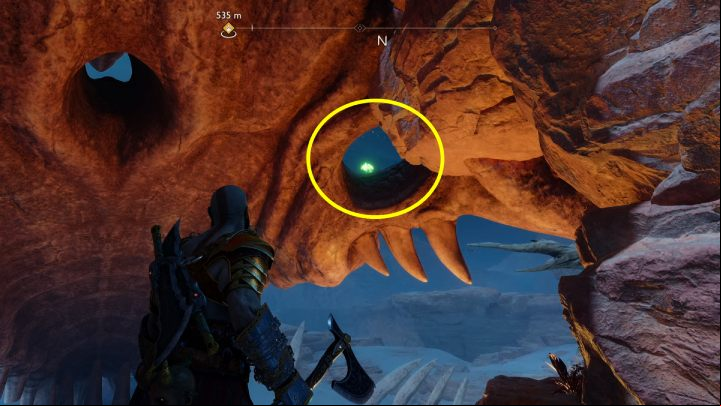 The bird is perched in one of the skeleton's eye sockets - God of War Ragnarok: The Barrens, Alfheim - secrets, collectibles - Alfheim - God of War Ragnarok Guide
