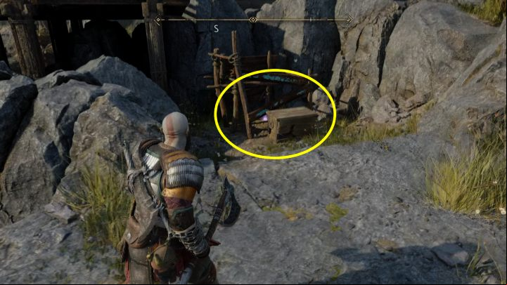 The item is hidden behind boards under a wooden path - God of War Ragnarok: The Forge, Svartalfheim - secrets, collectibles - Svartalfheim - God of War Ragnarok Guide