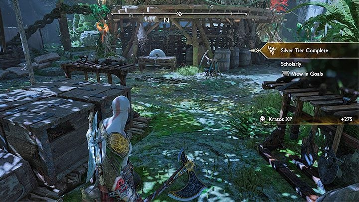 The scroll lies on the ground in the camp, near the crane that can be rotated - God of War Ragnarok: The Abandoned Village, Vanaheim - secrets, collectibles - Vanaheim - God of War Ragnarok Guide
