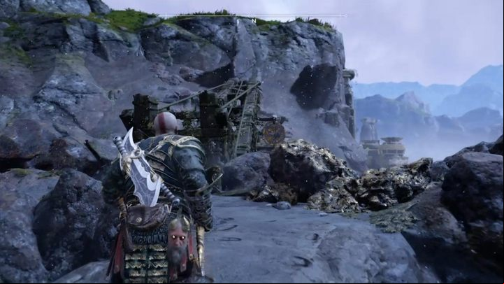 Commentary: You can find this artifact near the lifts - you have to throw the axe at the bomb among the stones - God of War: Isle of Death - all collectibles list - Shores of Nine - God of War Guide