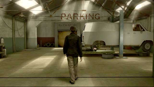 Speak with the mechanic and then use the yellow elevator - The Bear | Heavy Rain Walkthrough - Walkthrough - Heavy Rain Guide