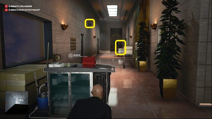 The corridor is guarded by one guard and a camera on the wall to the left - Hitman 3: Best Disguises, Dubai (Burj Al-Ghazali) - On Top of the World - Dubai - Hitman 3 Guide
