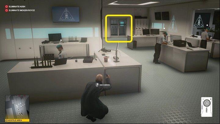 Hide behind the desk of one of the guards - Hitman 3: Chongqing - Best Disguises - End Of An Era - Chongqing - Hitman 3 Guide