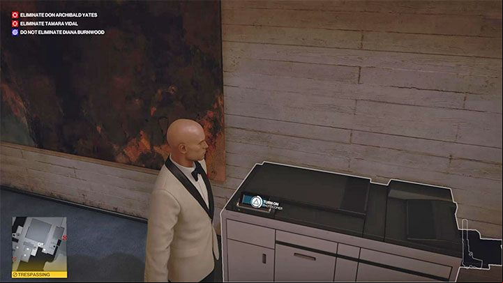 Explore the hallway southwest of the security room to find the photocopier shown in the picture - Hitman 3: Surveillance cameras - where to sabotage it? - The Farewell - Mendoza - Hitman 3 Guide