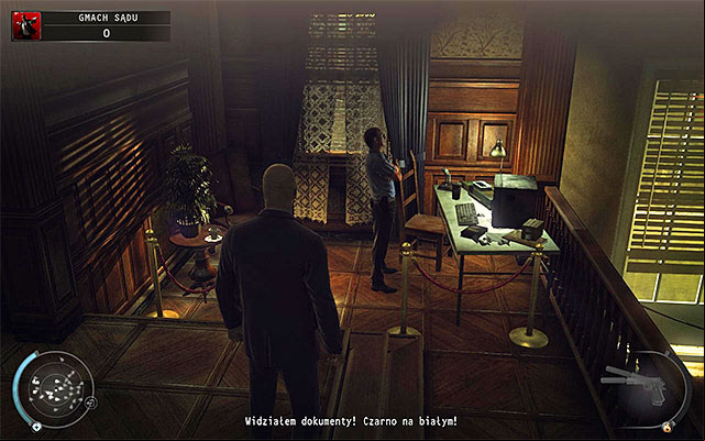A computer terminal to interact with is located left from the entrance to the balcony - Courthouse - Getting to the holding cells in defendant disguise | 15: Skurkys Law - 15: Skurkys Law - Hitman: Absolution Game Guide