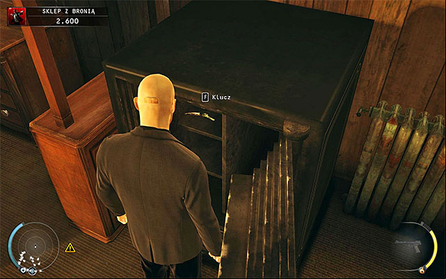 Regardless of your behavior, you have to open the safe and take a keycard to the cabinet out of it - Gun Shop - Getting the key to the cabinet | 8: Birdies Gift - 8: Birdies Gift - Hitman: Absolution Game Guide