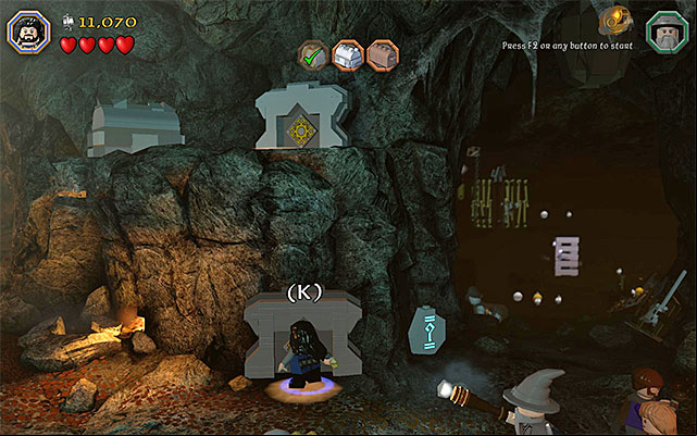 Walk through the bottom manhole to reach the ledge with the chest - Stage 5 (The Troll Hoard): Explore the cave | Walkthrough | LEGO The Hobbit - Walkthrough - LEGO The Hobbit Game Guide & Walkthrough