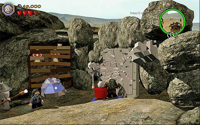 To destroy the wall, you need to cooperate - Stage 5 (The Troll Hoard): The orc encounter | Walkthrough | LEGO The Hobbit - Walkthrough - LEGO The Hobbit Game Guide & Walkthrough