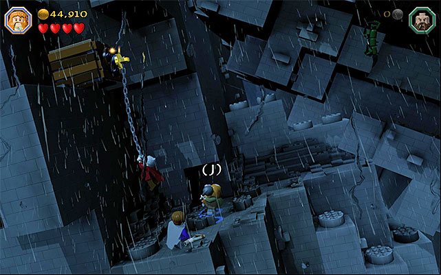 After Dori reaches the catch, you need to leap towards him, as any character - Stage 6 (Over Hill and Under Hill): Climb the stone giant | Walkthrough - Walkthrough - LEGO The Hobbit Game Guide & Walkthrough