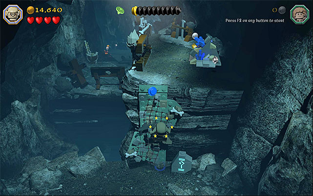 Switch to the confused goblin and use the fact that goblins can climb over the select walls - Stage 7 (Goblin-town): Cooperation with a goblin | Walkthrough | LEGO The Hobbit - Walkthrough - LEGO The Hobbit Game Guide & Walkthrough