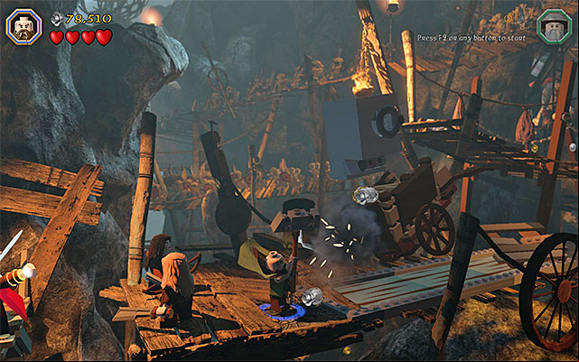 Use the warhammer on the obstacle - Stage 7 (Goblin-town): Escape from the goblin city | Walkthrough - Walkthrough - LEGO The Hobbit Game Guide & Walkthrough
