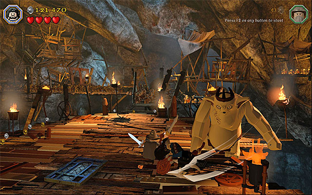 Run around the arena and keep a safe distance from the boss - Stage 7 (Goblin-town): The second battle with Great Goblin | Walkthrough - Walkthrough - LEGO The Hobbit Game Guide & Walkthrough