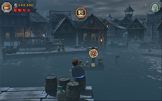 The target is attached to one of the boats - Stage 12 (A Warm Welcome) | Main Stages - Collectibles - Main Stages - Collectibles - LEGO The Hobbit Game Guide & Walkthrough