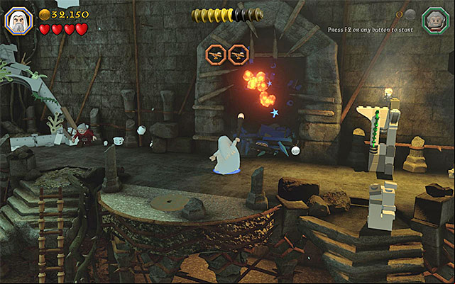 The blue gate with a minikit behind it - Stage 14 (The Necromancer) | Main Stages - Collectibles - Main Stages - Collectibles - LEGO The Hobbit Game Guide & Walkthrough