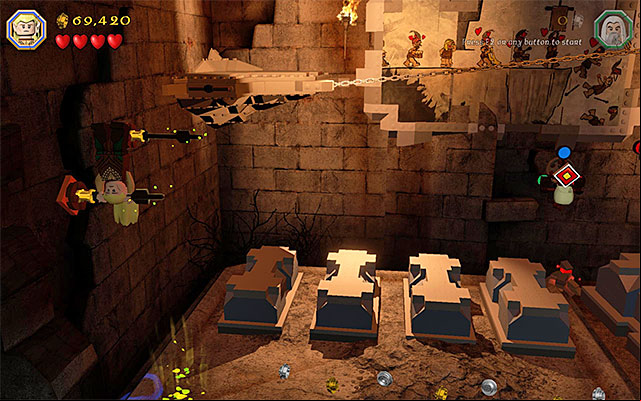Grab the arrow stuck in the wall - Stage 14 (The Necromancer) | Main Stages - Collectibles - Main Stages - Collectibles - LEGO The Hobbit Game Guide & Walkthrough