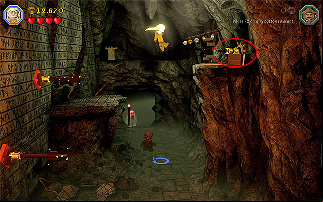 The second knob is on the ledge high above shown in the above screenshot, which is located in the right side of the cave - Stage 3 (Azog the Defiler) | Main Stages - Collectibles - Main Stages - Collectibles - LEGO The Hobbit Game Guide & Walkthrough