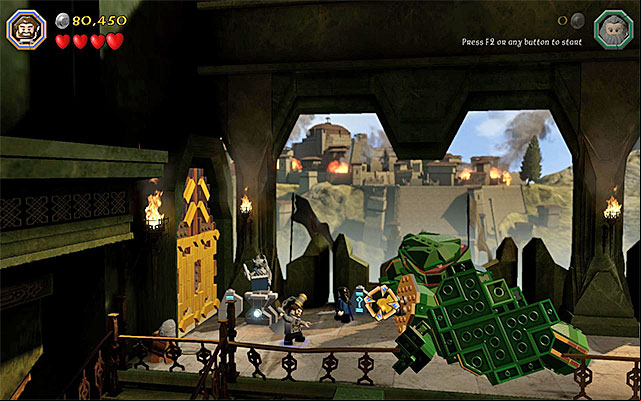 You need to aim at the fallen pillar - Stage 1 (Greatest Kingdom in Middle-Earth): Smaugs attack | Walkthrough - Walkthrough - LEGO The Hobbit Game Guide & Walkthrough