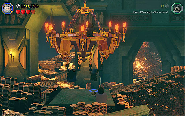 Jump towards the handles, thanks to which the chandelier will break loose - Stage 1 (Greatest Kingdom in Middle-Earth): Smaugs attack | Walkthrough - Walkthrough - LEGO The Hobbit Game Guide & Walkthrough
