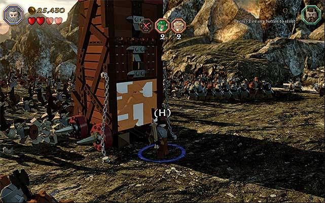 Use team action to destroy one of the walls of the siege tower - Stage 3 (Azog the Defiler): The battle with the Orcs | Walkthrough - Walkthrough - LEGO The Hobbit Game Guide & Walkthrough