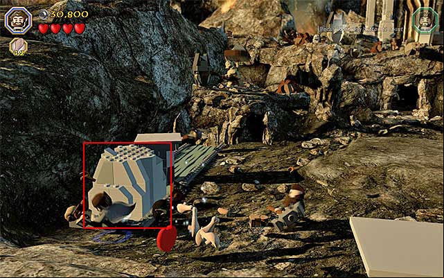 In order to make it over to the ledge, where Azog is, you need to stand next to the big block shown in the above screenshot - Stage 3 (Azog the Defiler): The battle with Azog the Defiler | Walkthrough - Walkthrough - LEGO The Hobbit Game Guide & Walkthrough