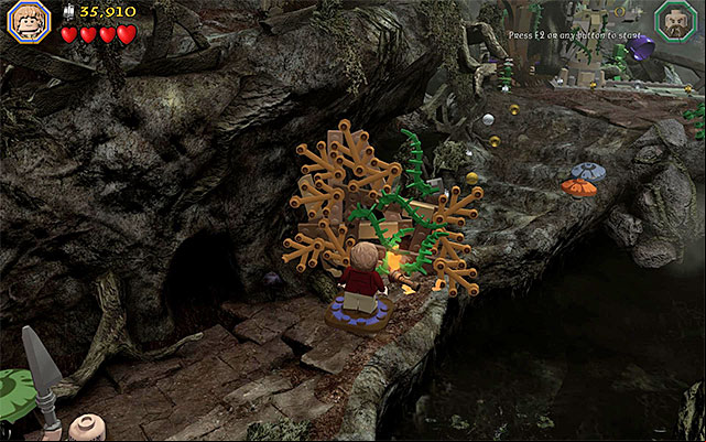 You need to set the barricade on fire - Stage 10 (Flies and Spiders): The Dark Forest | Walkthrough | LEGO The Hobbit - Walkthrough - LEGO The Hobbit Game Guide & Walkthrough