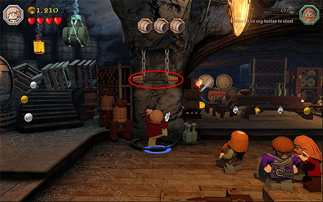 The lever that you need to grab onto - Stage 11 (Barrels Out of Bond): The cellar | Walkthrough | LEGO The Hobbit - Walkthrough - LEGO The Hobbit Game Guide & Walkthrough