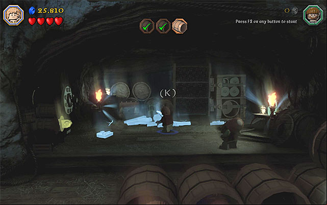 You need to put on the ring and hold down the building key - Stage 11 (Barrels Out of Bond): The cellar | Walkthrough | LEGO The Hobbit - Walkthrough - LEGO The Hobbit Game Guide & Walkthrough