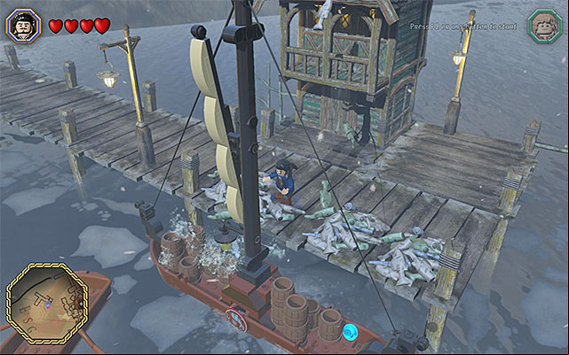 Toss fishes over to the ship - Middle-Earth: Make your way to Esgaroth | Walkthrough | LEGO The Hobbit - Walkthrough - LEGO The Hobbit Game Guide & Walkthrough