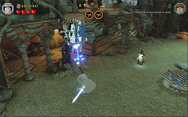 If you have performed the most recent action correctly, the stream of light will be sent towards the nearby target, thanks to which the age at the stairs will unlock - Stage 14 (The Necromancer): The keeps exterior | Walkthrough - Walkthrough - LEGO The Hobbit Game Guide & Walkthrough