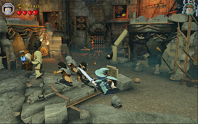 Attack the regular orcs when they pose direct threat to you, or whenever you need the hearts to replenish your health bar - Stage 14 (The Necromancer): The battle with Azog the Defiler | Walkthrough - Walkthrough - LEGO The Hobbit Game Guide & Walkthrough