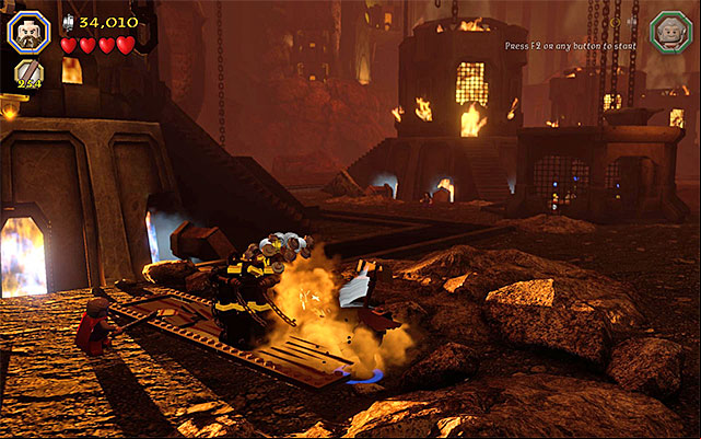 You need to give the block a push and start building - Stage 16 (Inside Information): Defeat Smaug | Walkthrough - Walkthrough - LEGO The Hobbit Game Guide & Walkthrough