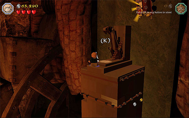 You need to reach the very top of the structure and press the appropriate button - Stage 16 (Inside Information): Defeat Smaug | Walkthrough - Walkthrough - LEGO The Hobbit Game Guide & Walkthrough