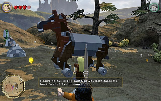 Jump onto the big mechanical horse and go towards the cave of the friendly troll - White question marks - walkthroughs for quests 41-60 | Middle Earth - Side missions - Middle Earth - Side missions - LEGO The Hobbit Game Guide & Walkthrough