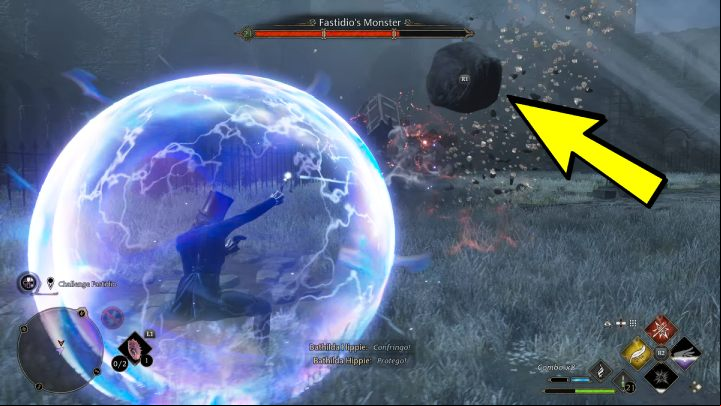 Use Ancient Magic and once you see a stone flying in your direction, cast Protego and press the right button to reflect the stone back at the enemy - Hogwarts Legacy: How to defeat Fastidios Monster? - Bosses - Hogwarts Legacy Guide