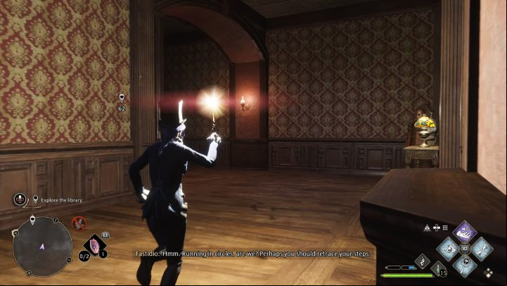 You're back in the empty room with a few mannequins present - Hogwarts Legacy: How to explore the library in the Minding Your Own Business quest? - Combat and exploration - Hogwarts Legacy Guide